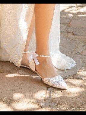 Twila Ivory Flats